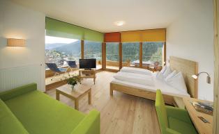 Panoramic luxury room with scenic windows on 2 sides